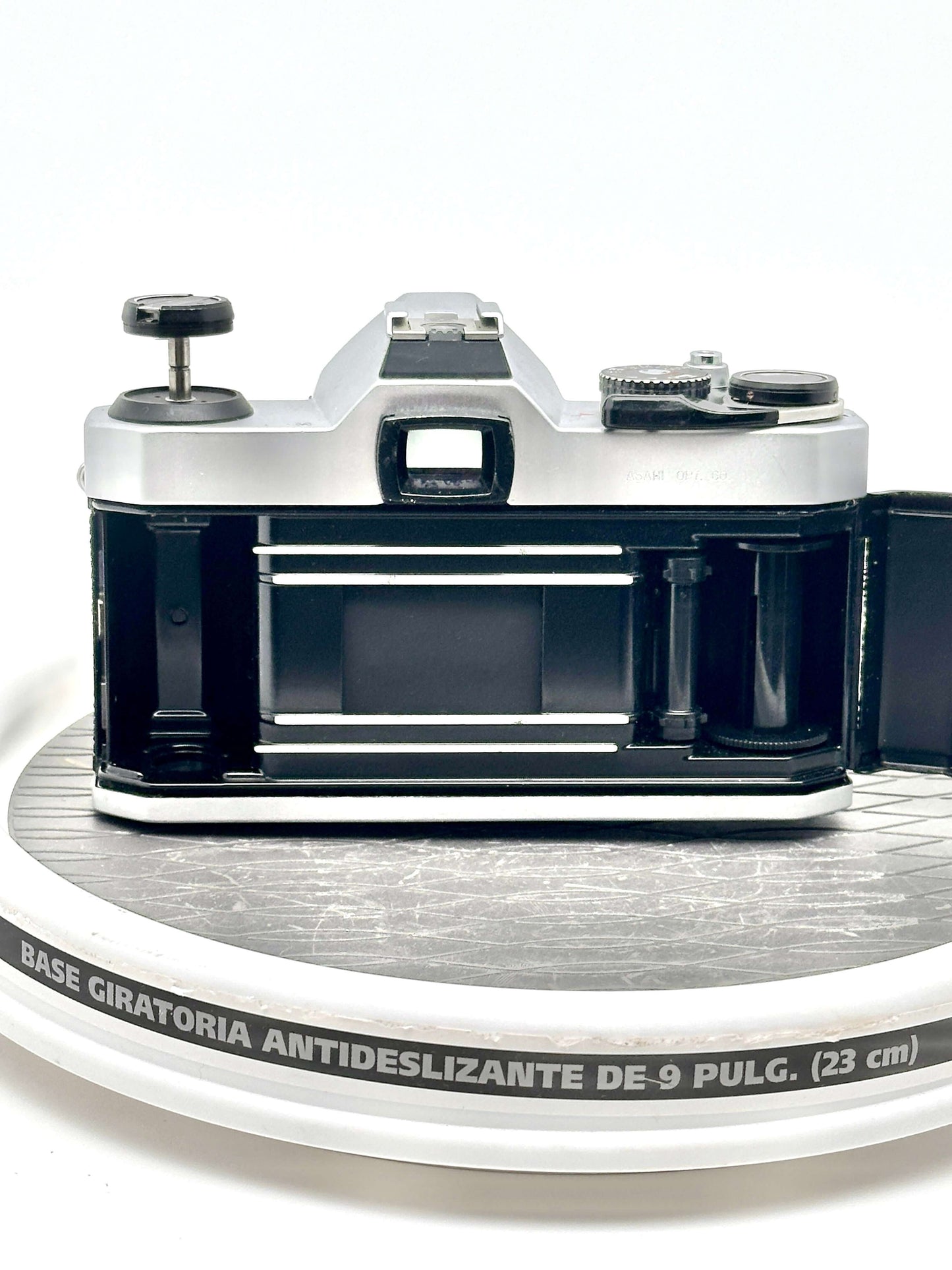 Rear view of a Pentax K1000 35mm film camera showcasing its loading compartment.
