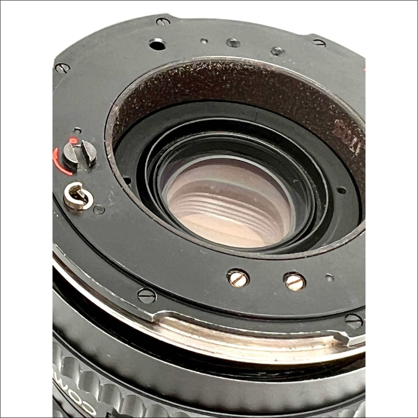 Close-up view of Hasselblad Carl Zeiss Distagon T* 50mm F4 lens mount and glass details.