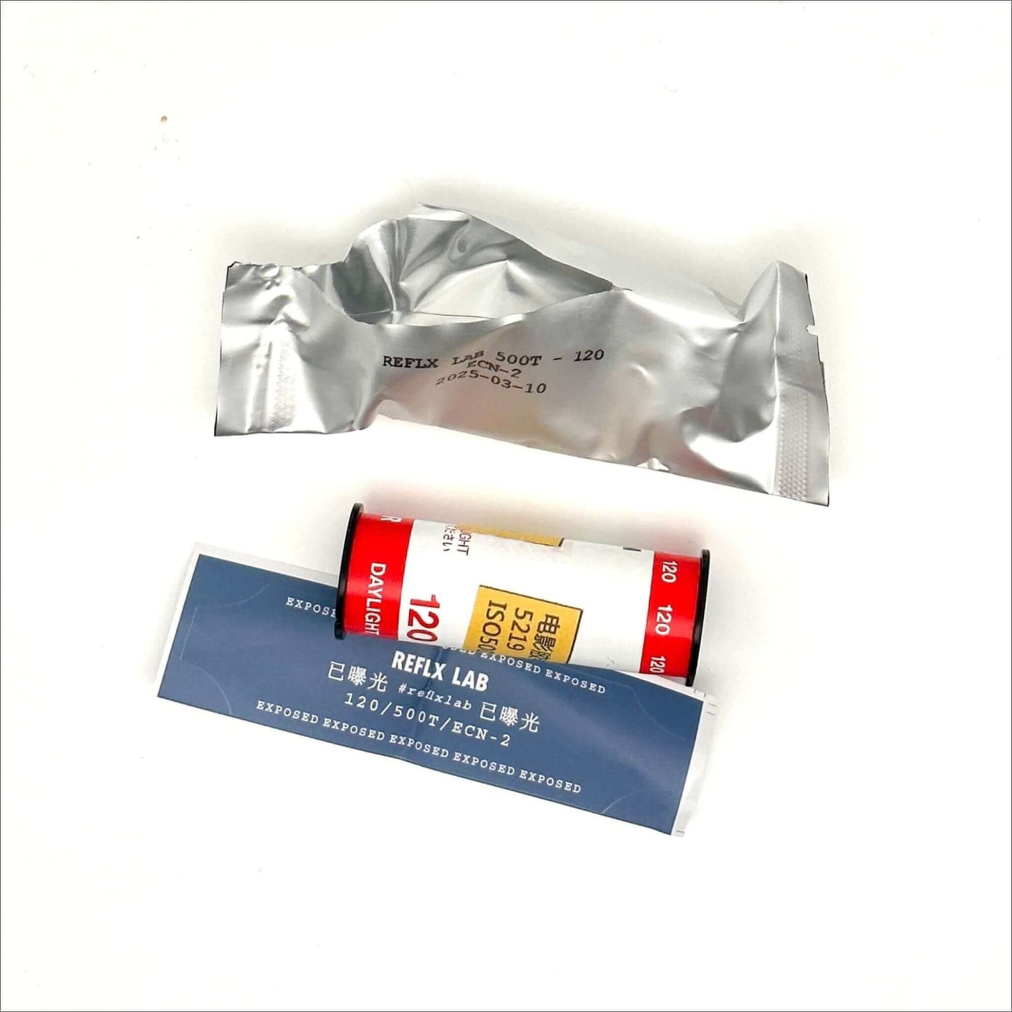 Reflx Lab 500T Color ECN-2 120 film packaging and canister for medium format photography.