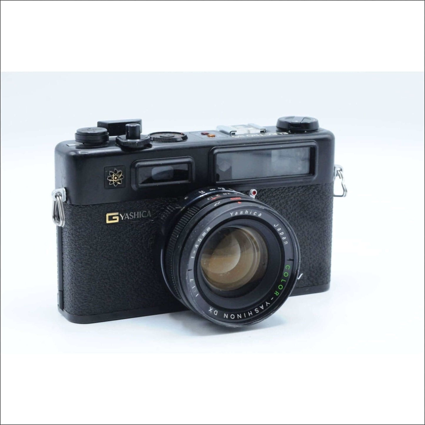 Yashica film camera with lens, featured in evaluation and testing services for film photography.