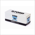 White rectangular box of ilford delta 100 professional black & white film with blue and black branding.