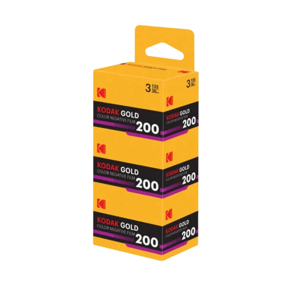 Yellow cardboard box of kodak gold 200 color negative film, featuring black and purple branding with three stacked rolls.