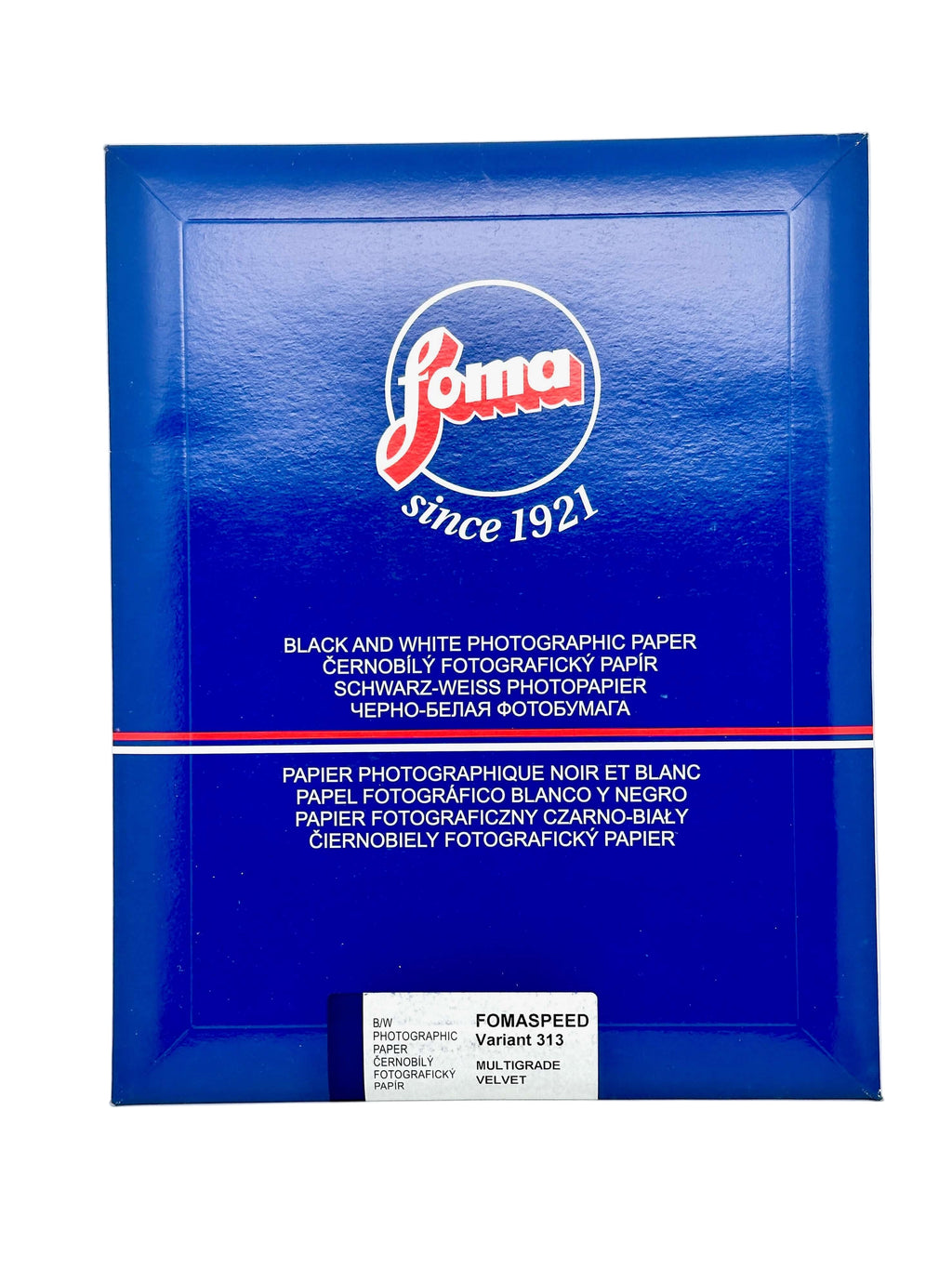 Blue foma brand box of black and white photographic paper, labeled as ’fomaspeed variant 313’’ with a multigrade velvet finish.
