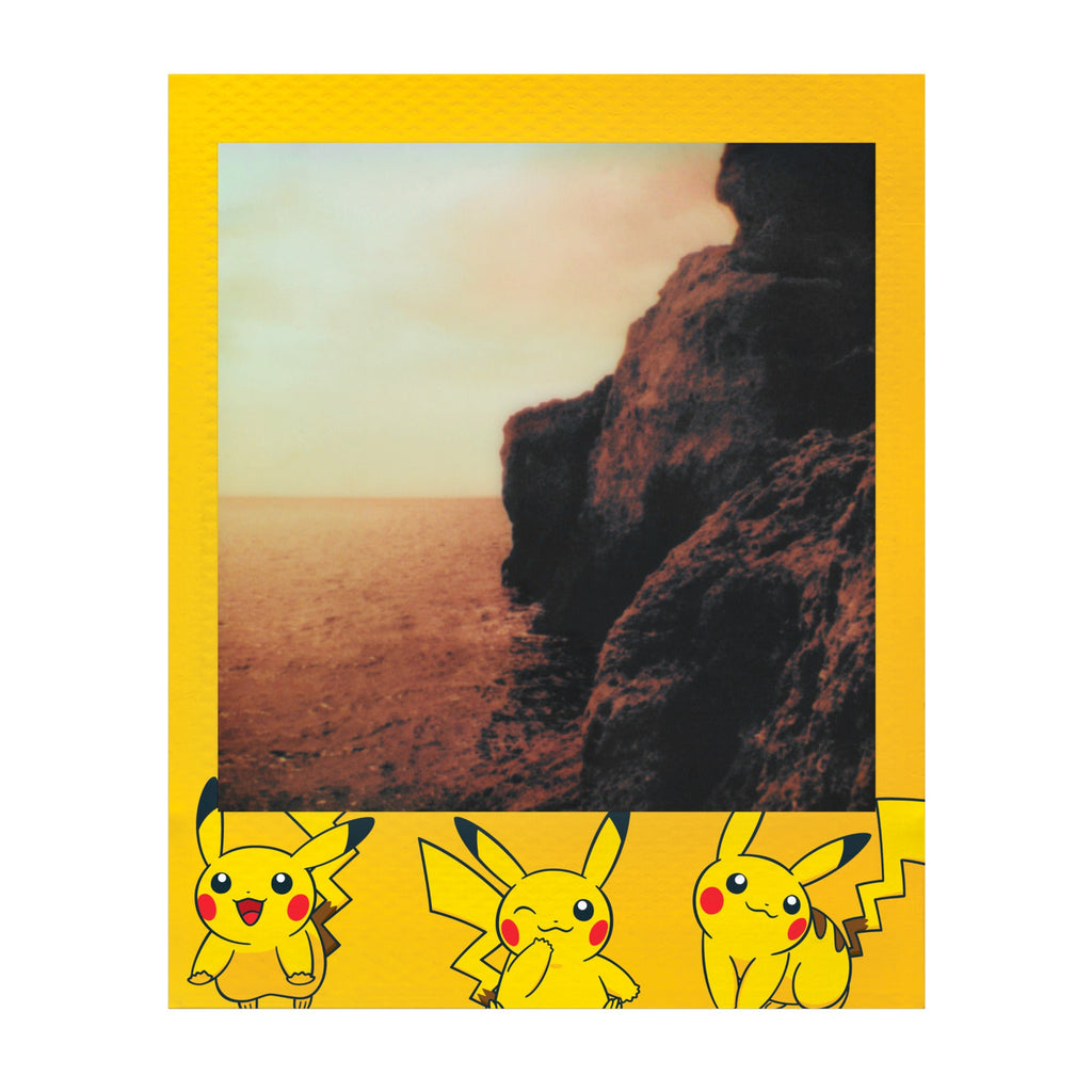 Polaroid Go photo of a desert rock at sunset in a yellow Pikachu frame