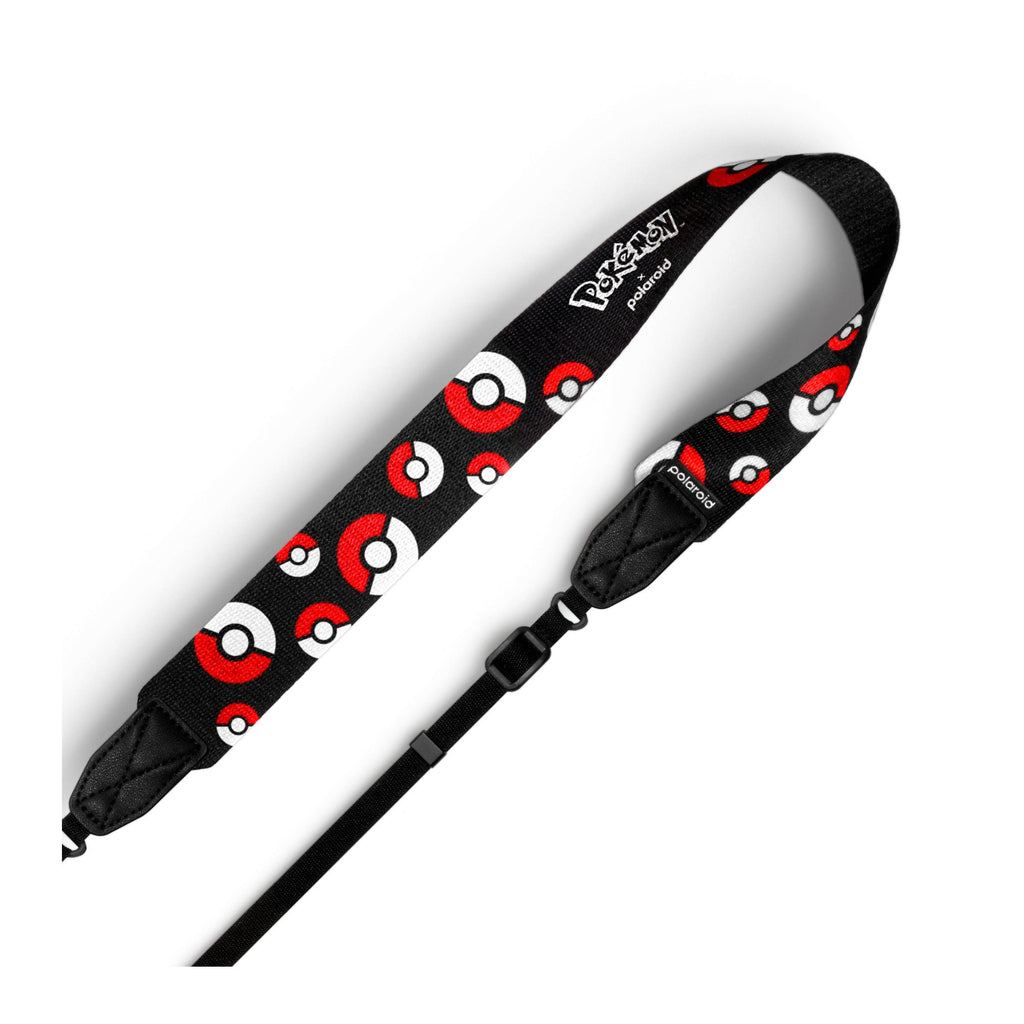 Polaroid flat camera strap with red, white and black Poké Ball pattern, full length