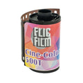 A vibrant, geometrically patterned roll of flic film cine-color 500t photographic film with a black plastic spool and perforated edges.