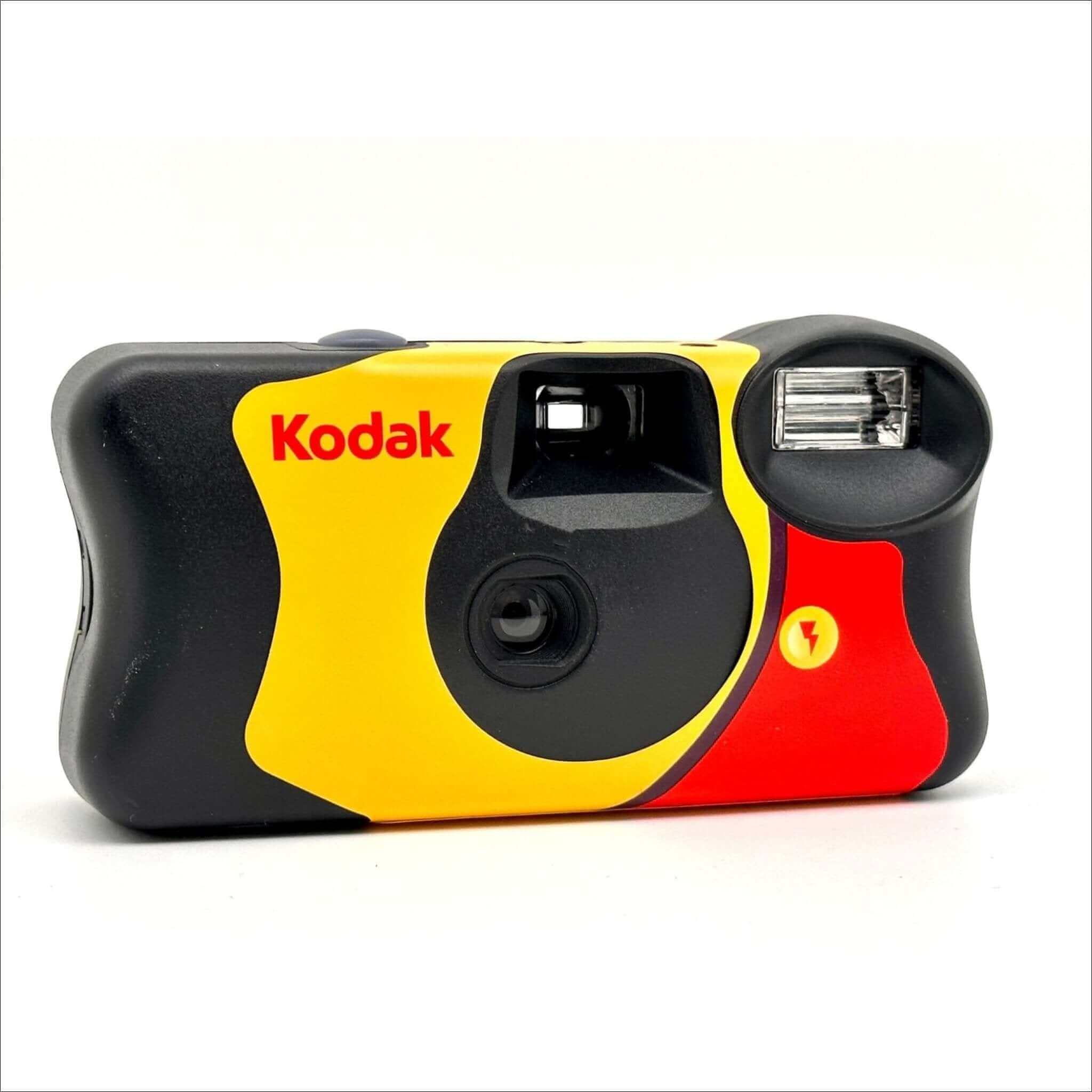 Vibrant yellow, black, and red kodak disposable camera with a built-in flash.
