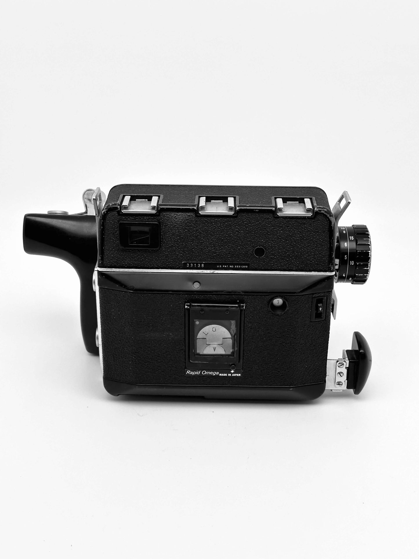 Koni Rapid-Omega 100 6x7 film camera with 90mm f/3.5 lens, rear view showing classic rangefinder design and vintage wear.