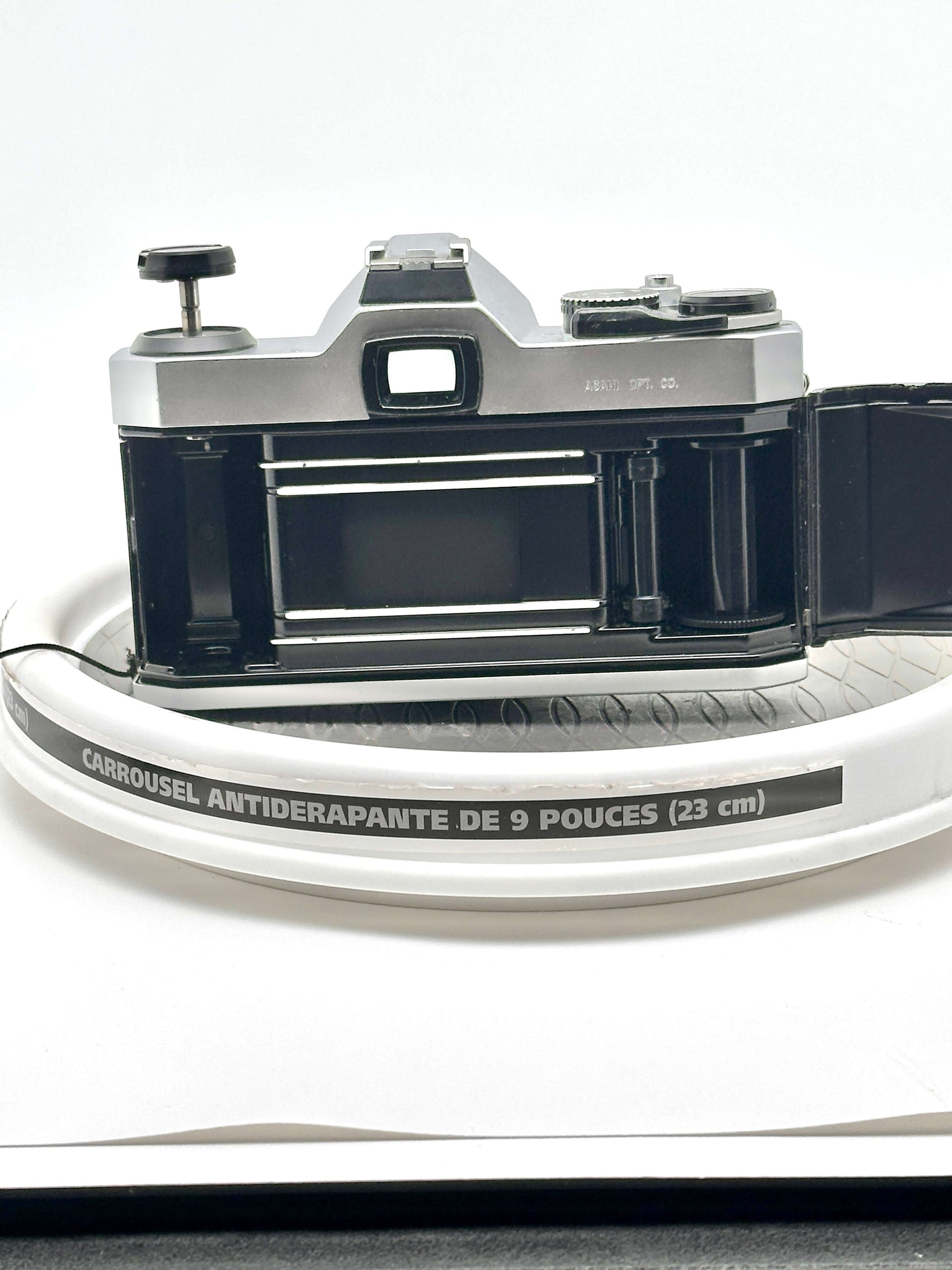 Rear view of the Japanese Asahi Pentax K1000 35mm film camera showing interior and film compartment.