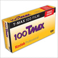 Yellow and purple kodak t-max 100 film box with black trim.