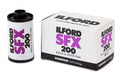 Ilford sfx 200 black and white film in a cylindrical canister with purple branding, displayed beside its matching white box.
