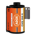 Orange and white labeled adox chs 100 ii black-and-white film roll with a black plastic spool.