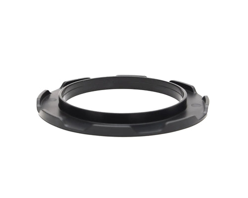Black plastic ring adapter with textured ridges and a central groove