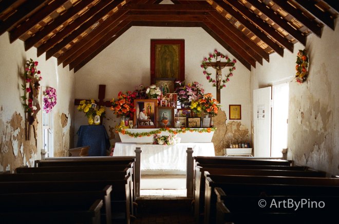 Altar with vibrant flowers and icons in Texas view fullsize film comparison