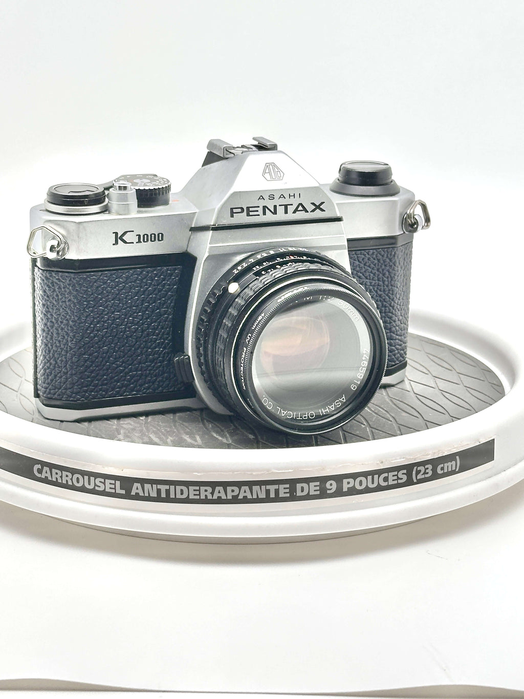 Japanese Asahi Pentax K1000 used 35mm film camera with 50mm f2 lens on display.