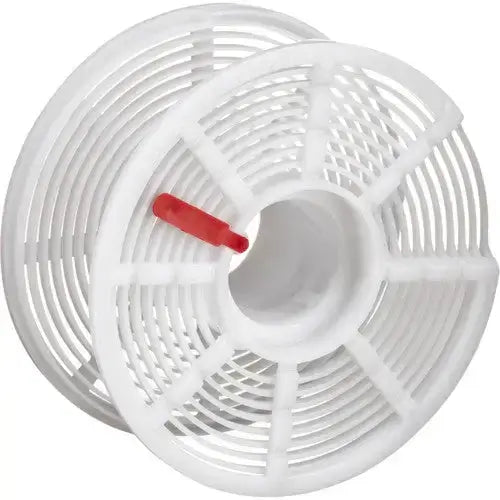 White plastic film spool with a red handle.