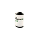 White and black film roll labeled ’original wolfen cine un54’’.