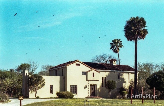 Beige stucco house with red-tiled roof and palms, view fullsize Epson V600