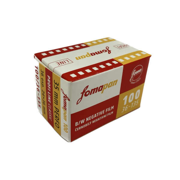 Red and white fomapan 100 b/w negative film box with yellow accents.