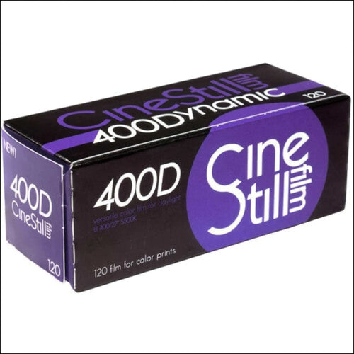 Purple and black cinestill 400d 120 film box with white lettering.