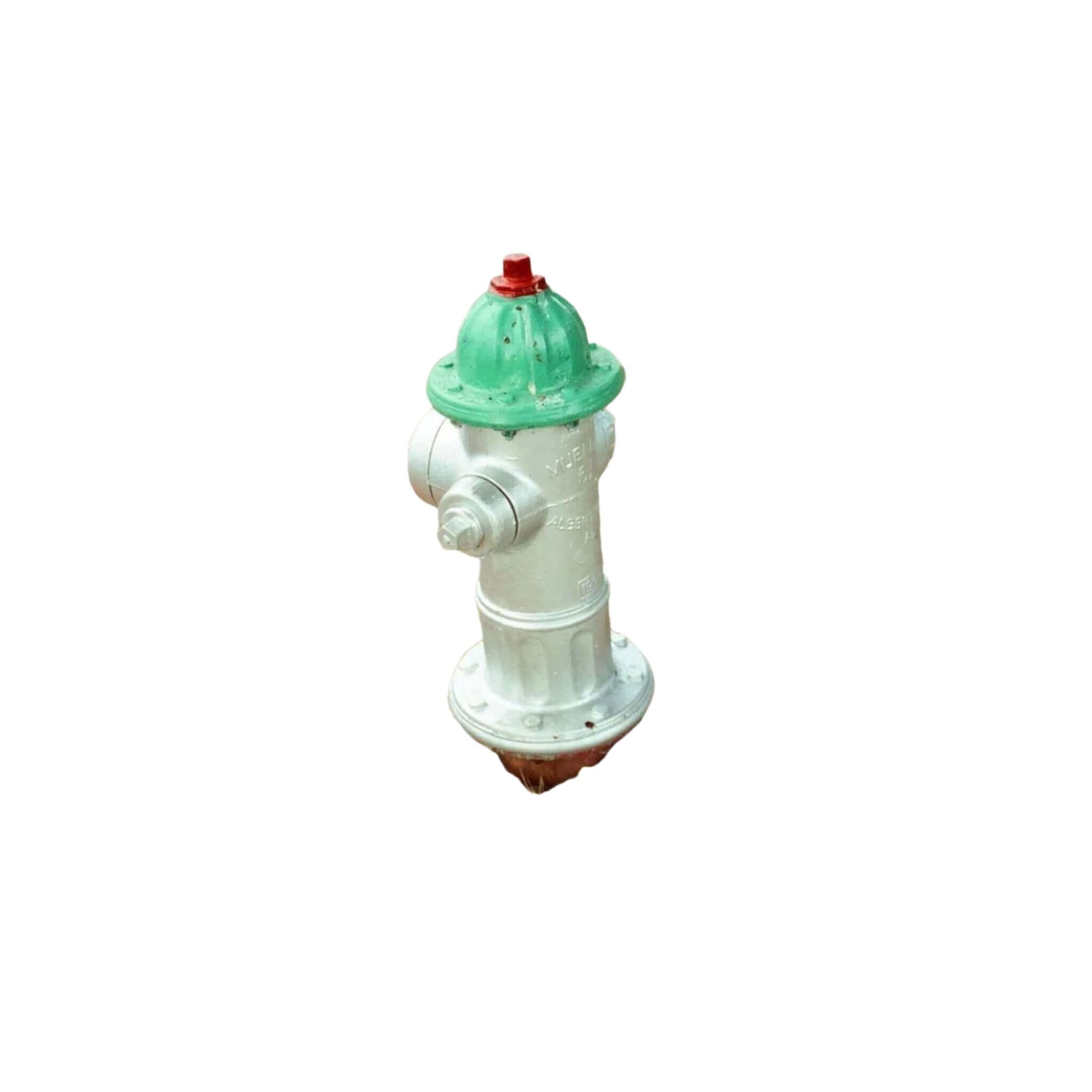A silver fire hydrant with a green top and red cap, set in a gravel bed beside a sidewalk.