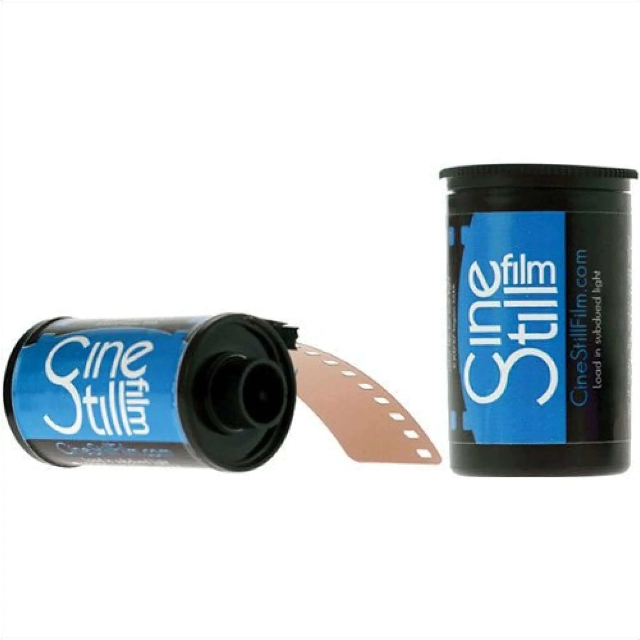 Blue and black cinestill film canisters with one showing a strip of brown photographic film emerging from its open end.