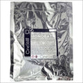 Silver foil packet containing a cinestill d96 developer and fix monobath single-step solution for film photography.