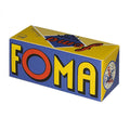 Vibrant yellow and blue cardboard box with bold red, black, and white lettering spelling ’foma’ in a retro design.