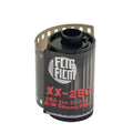 Black flic film xx-250 b/w cinema film roll with red and white labeling.