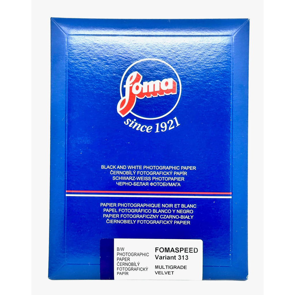 Blue foma fotopaper box with ’fomaspeed variant 313’’ label, featuring multigrade velvet texture for black and white photographic paper.