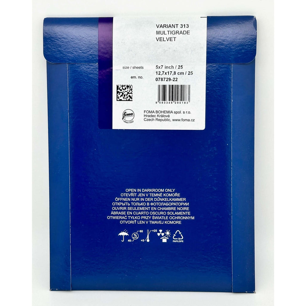 Blue rectangular box with a white label displaying product details for ’variant 313 multigrade velvet’ by foma bohemia.