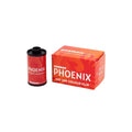 Red harman phoenix iso 200 colour film canister with black cap next to its matching orange packaging.