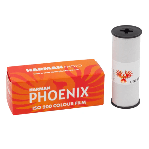 HARMAN Phoenix 200 ISO color film package and roll, showcasing its vibrant design for analog photography enthusiasts.