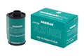 Teal-colored harman azure iso 125 creative film roll with black caps and white lettering.