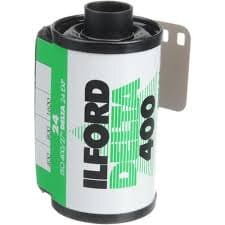 Ilford Delta 400 medium format film in white and green canister
