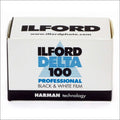White cardboard box of ilford delta 100 professional black & white film with blue and black branding.