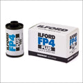 Ilford fp4 plus 125 black and white film roll in a white box with blue and black branding.