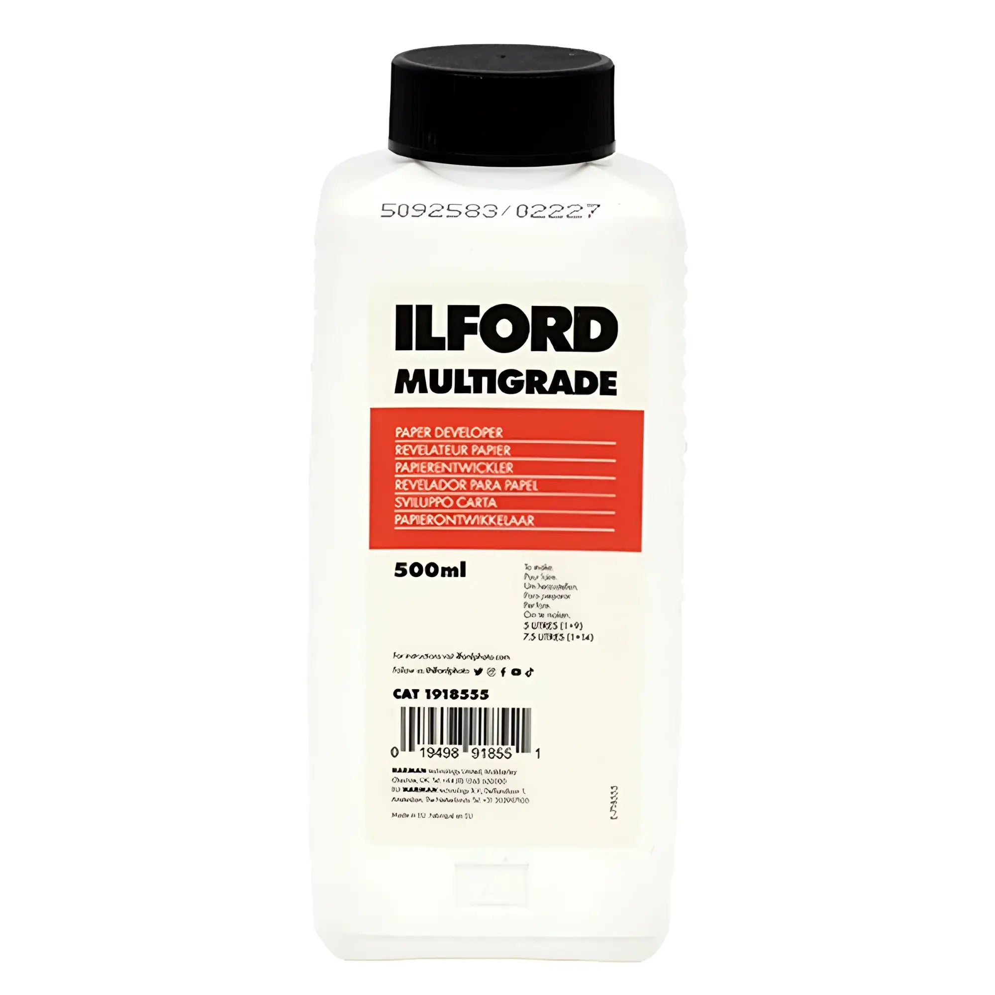 A clear plastic bottle with a black cap, labeled ’ilford multigrade’ in bold black text on a white label featuring an orange rectangular section.