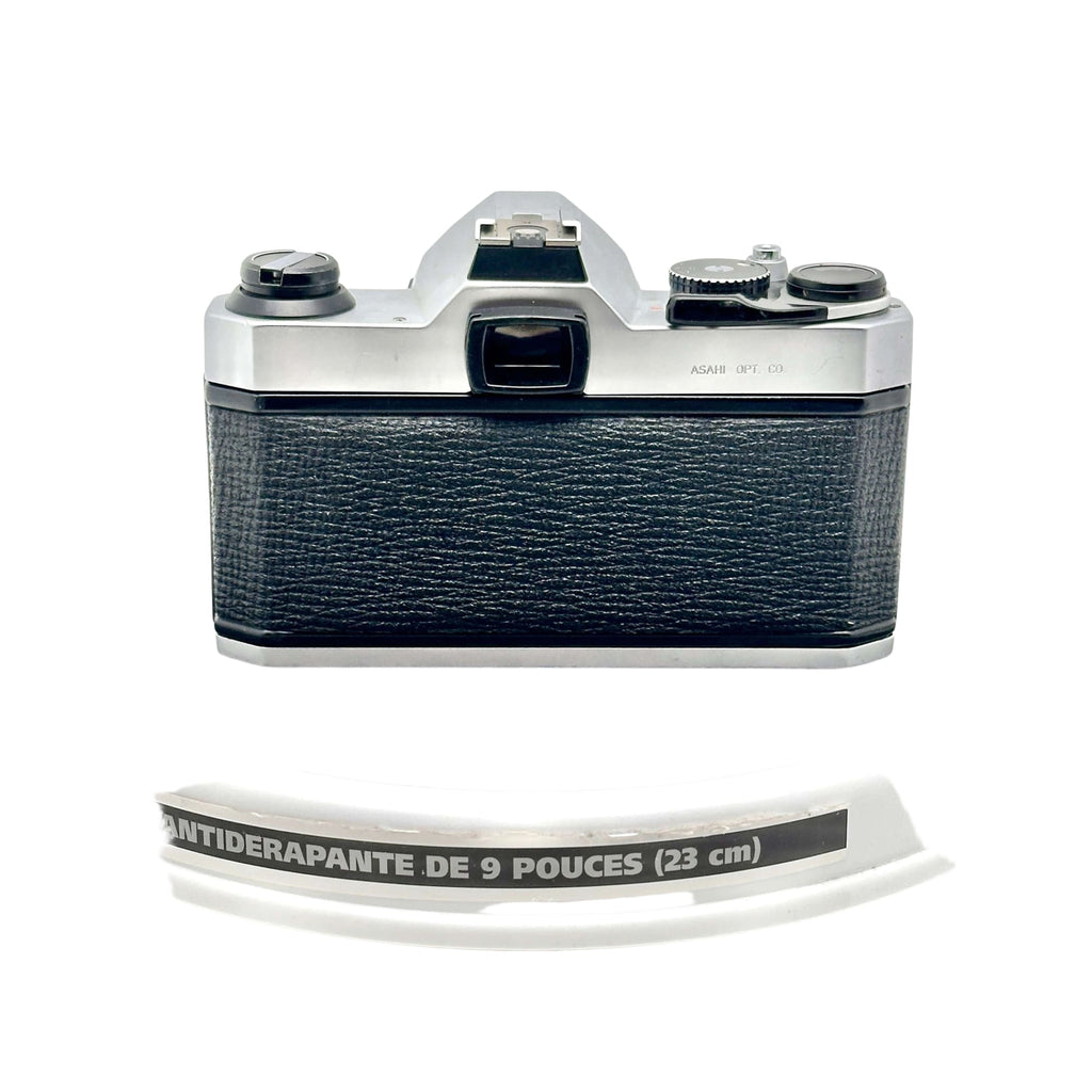 Silver and black asahi pentax 6x7 film camera with textured leather grip.