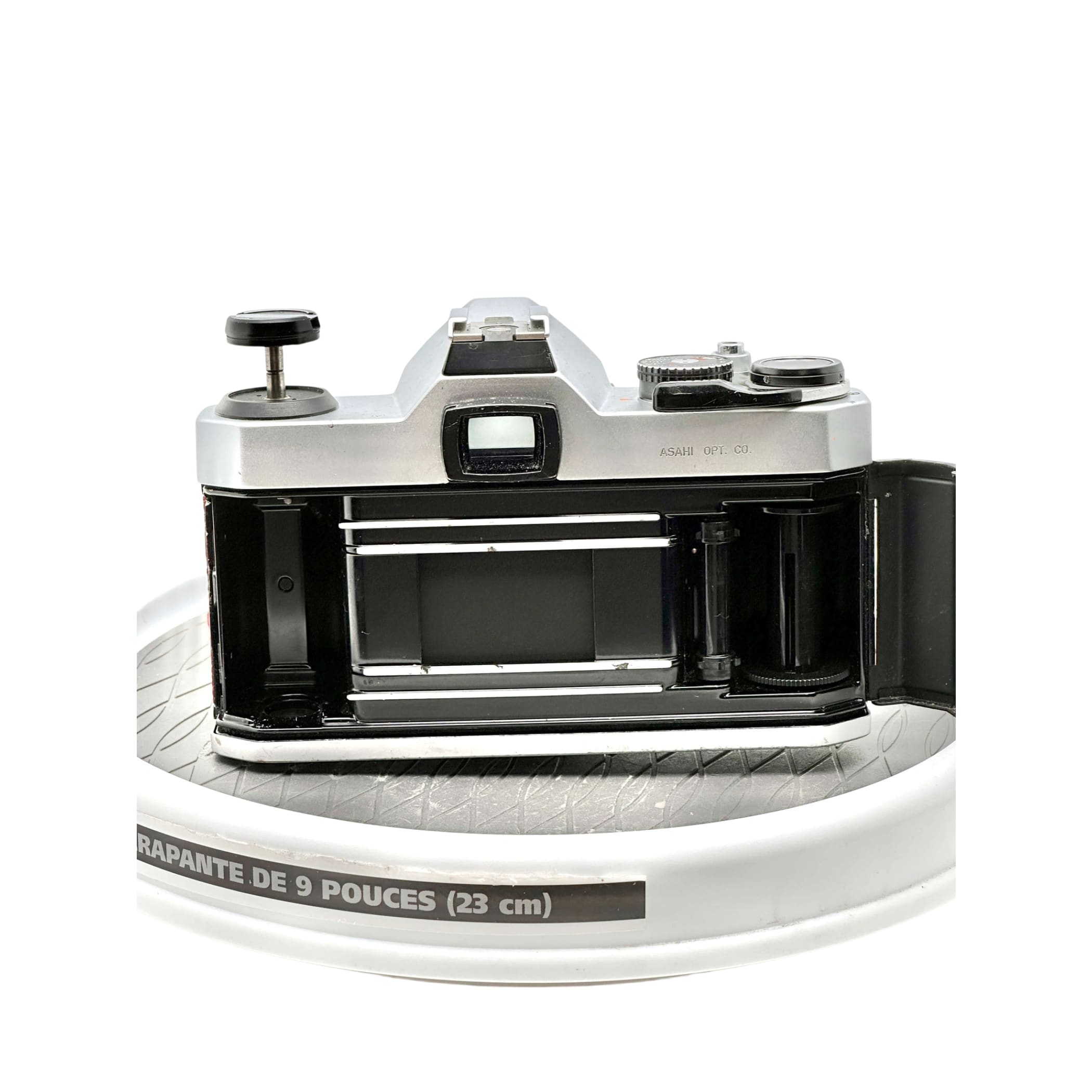 Silver-bodied, vintage asahi pentax 67 camera with black accents and a classic rangefinder design.