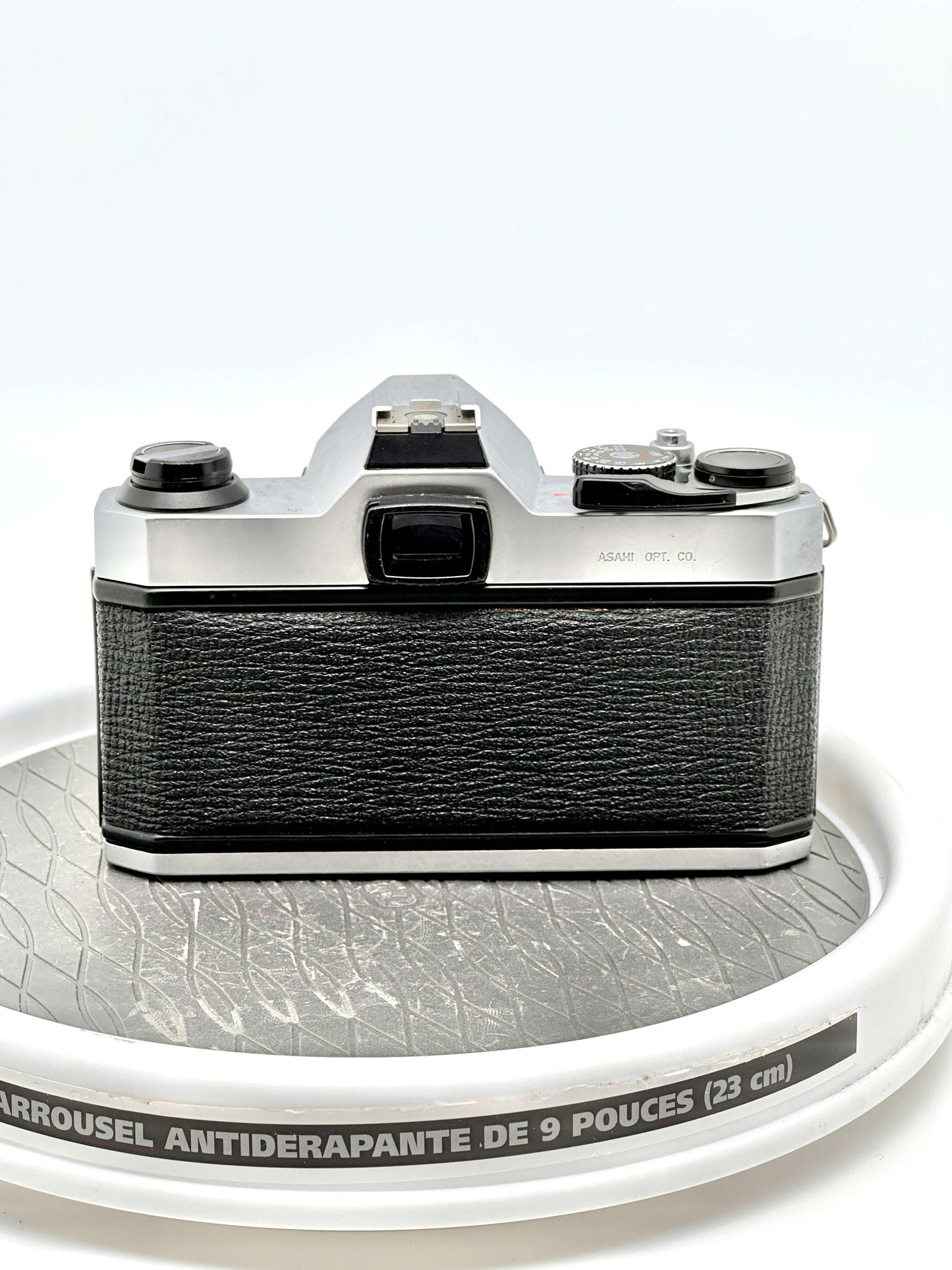 Back view of Japanese Asahi Pentax K1000 black 35mm film camera with textured finish.