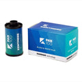 Blue and teal gradient-colored kentmere pan 100 black & white film canister with a black cap, displayed next to its matching box.