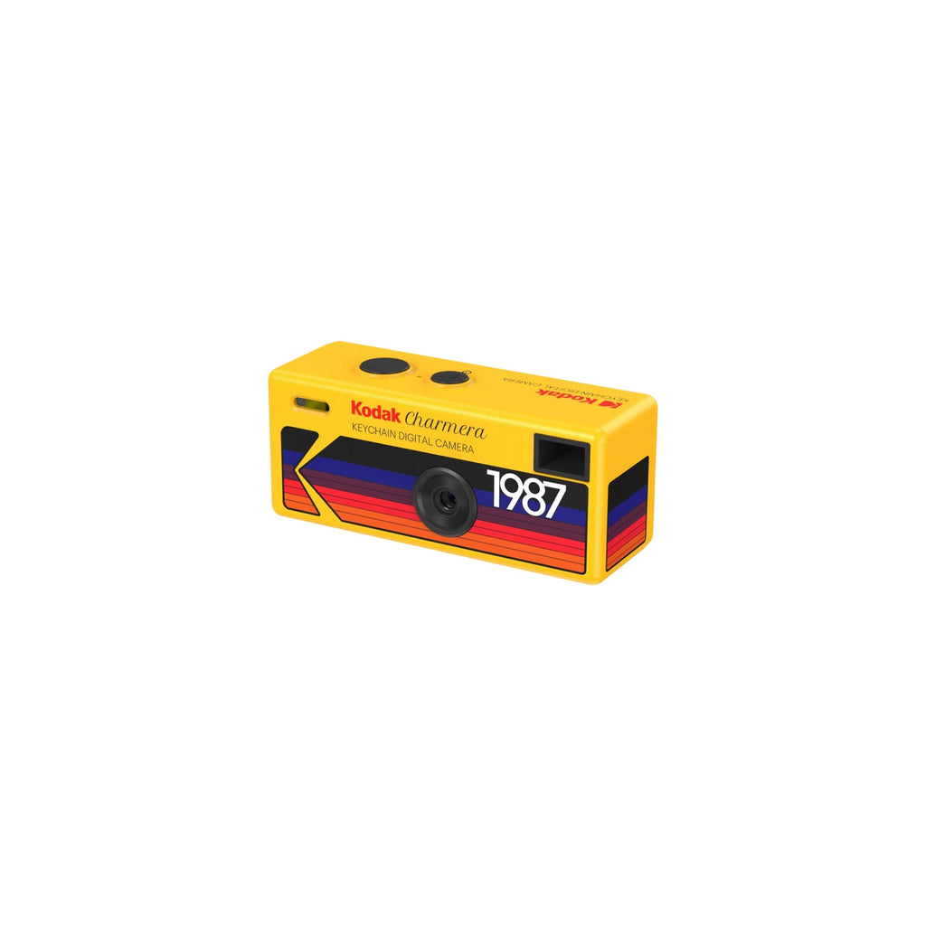 Vibrant yellow kodak charmera keychain digital camera featuring a retro 1987 design with bold red, blue, and orange stripes.