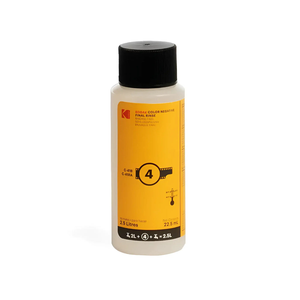 Kodak color negative final rinse solution in a translucent white bottle with a black cap and bright yellow label.