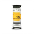 Kodak professional gold 200 film roll, featuring a cylindrical design with black and white ends and a prominent yellow label displaying ’120’’ for medium format photography.