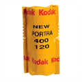 Yellow kodak portra 400 film pack for 120 format, featuring bold red and black text on a glossy plastic wrapper.