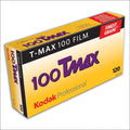Yellow and purple kodak t-max 100 film box with black trim.