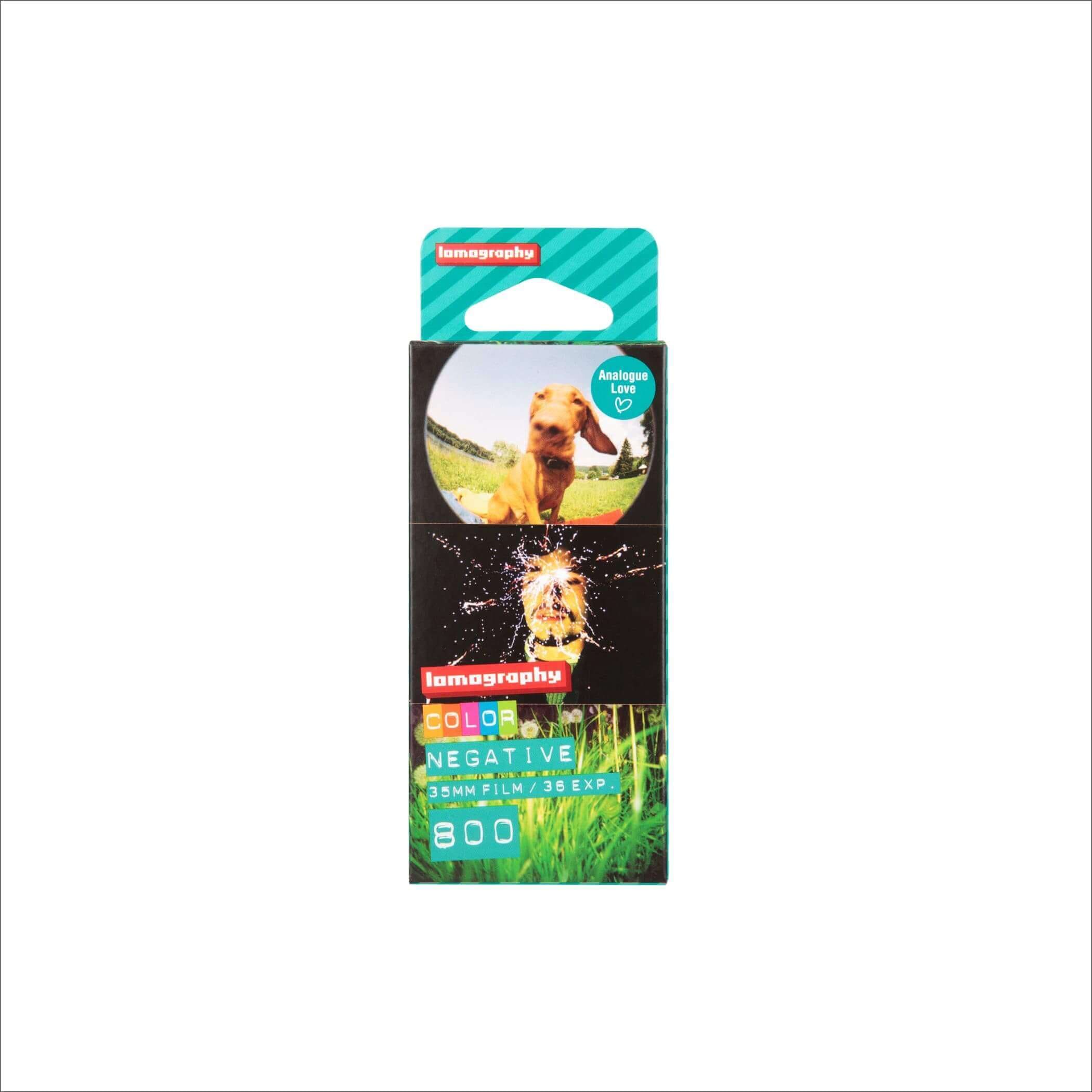 Lomography color negative 35mm film pack with vibrant green and black packaging featuring a dog photo on the front.