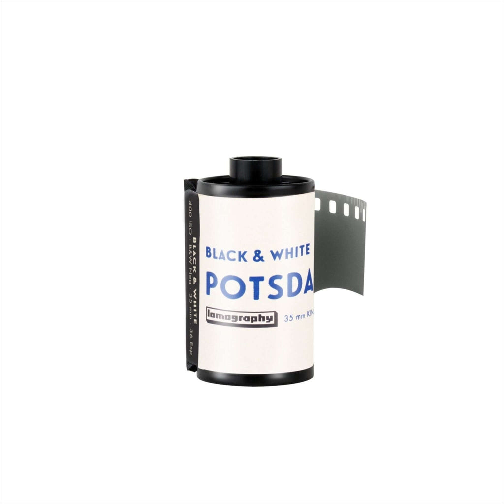 Lomography Potsdam Kino 100 ISO Black and White 35mm film roll with film strip.