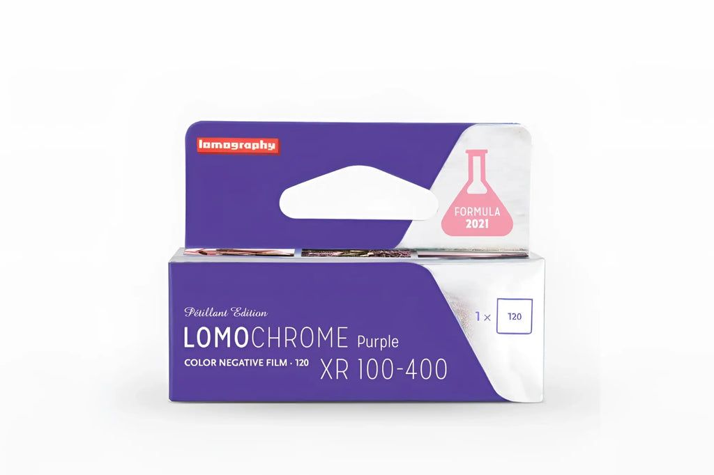 Purple and silver lomochrome purple color negative film box from imagography, featuring a sleek design with ’formula 2021’’ branding.
